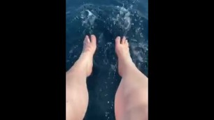 Size 11 Feet Playing in Pond Water