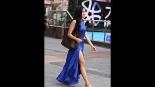 Stunning Woman in Blue Silk Satin Dress with Open back