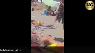 CAUGHT MASTURBATING IN a CROWED BEACH!!!!